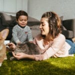 Mother and Son with Adopted Dog and Cat